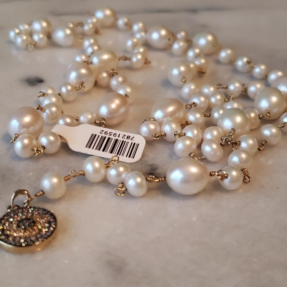 Rachel Lynn Chicago Jewelry - Freshwater pearl and evil eye cubic zirconia